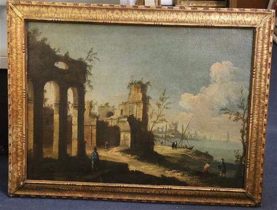 Follower of Michele Marieschi (1710-1743) Capriccio landscape with a Venetian port 20 x 28in.
